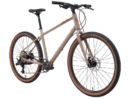 Kona Dew 2025 jalgratas Toffee Brown värvuses, millel on mustad rattad ja ketaspidurid.
